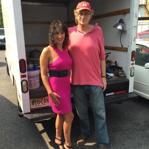 with publicist and writer/blogger Laura Madsen in front of film equipment truck in paved parking lot
